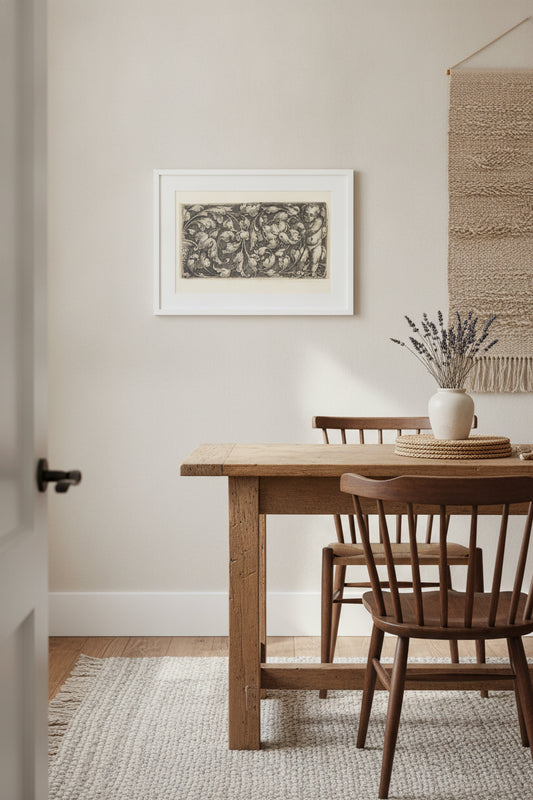 Naked Infant Holding a Double Scroll of Leafy Ornament — framed art in a styled interior