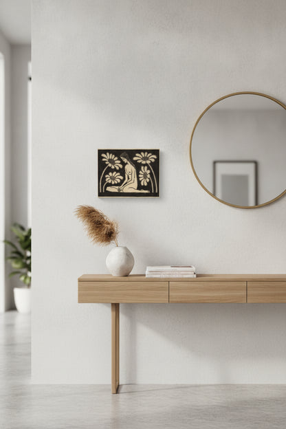 Seated Female Nude with Flowers — framed art in a styled interior