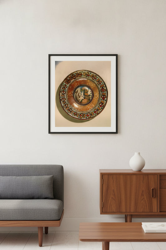 Plate with running plant border and geometric panels on well; in the center, profile bust of a man in armor — framed art in a styled interior